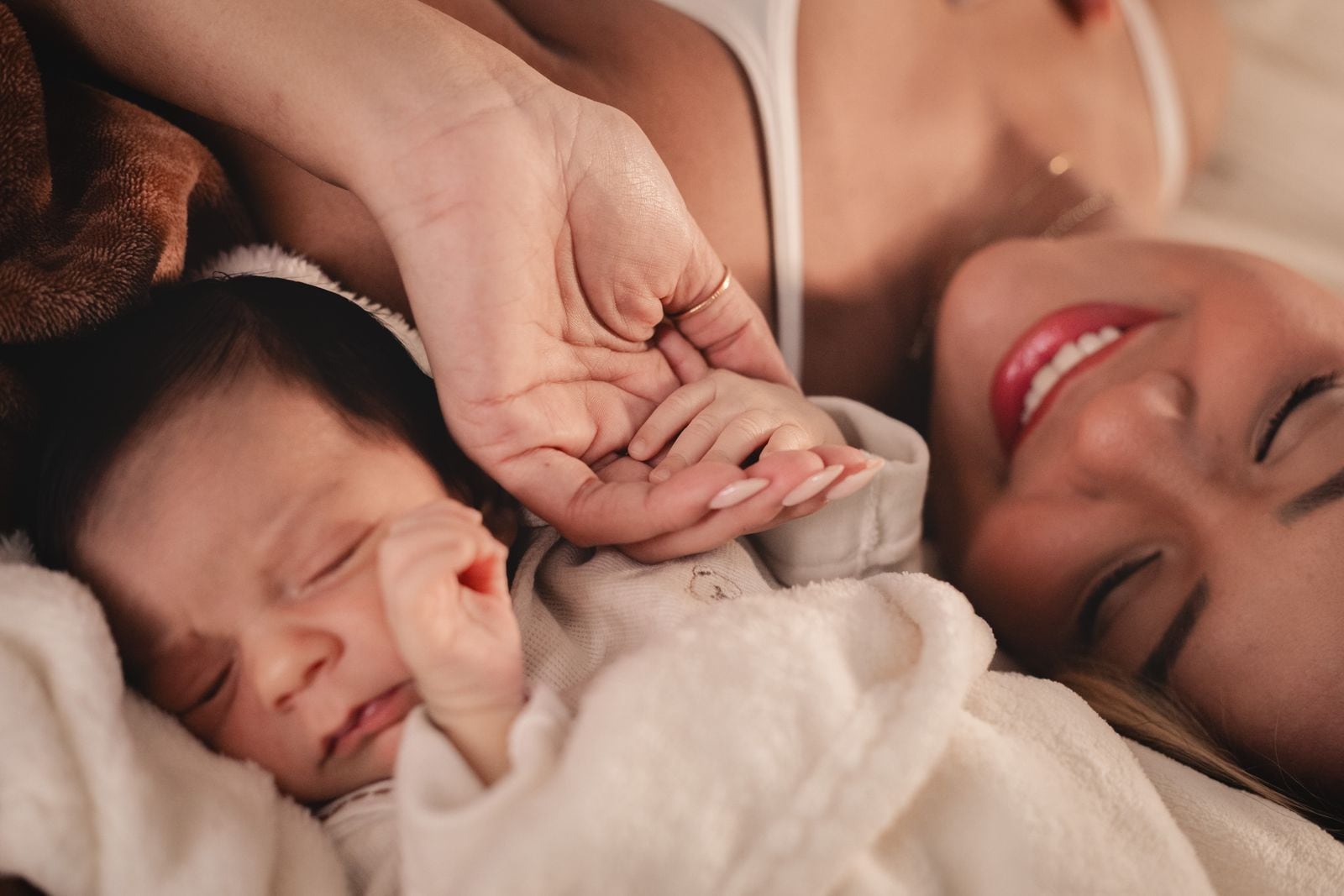 Mama Baby Care products arranged in a lifestyle setting